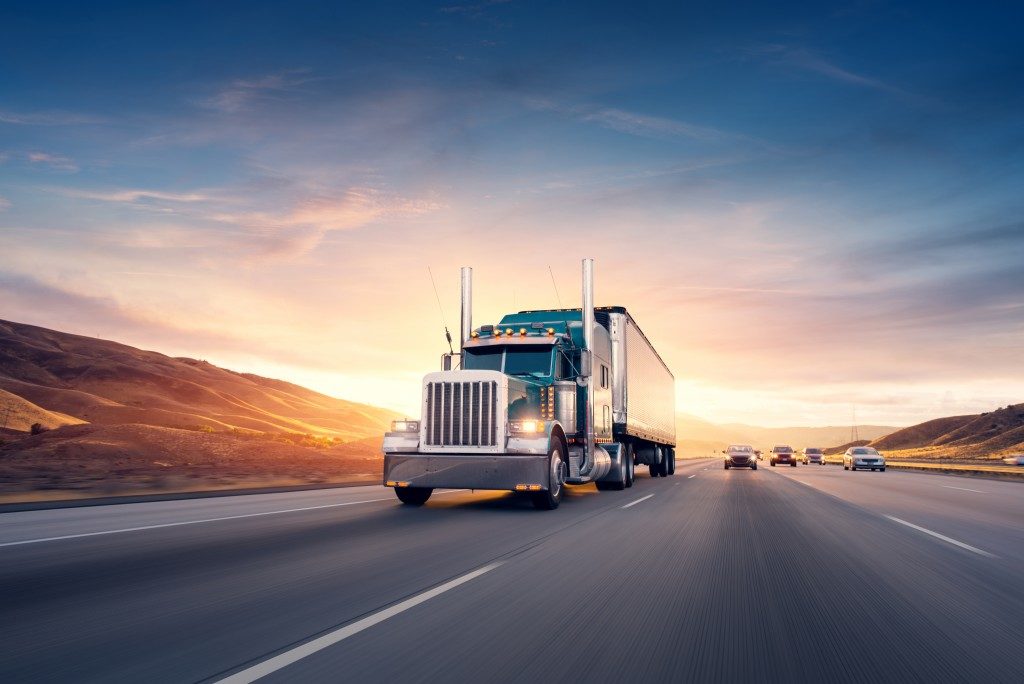 Freight truck with sunset background